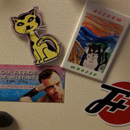 f plus logo on the fridge with several other magnets